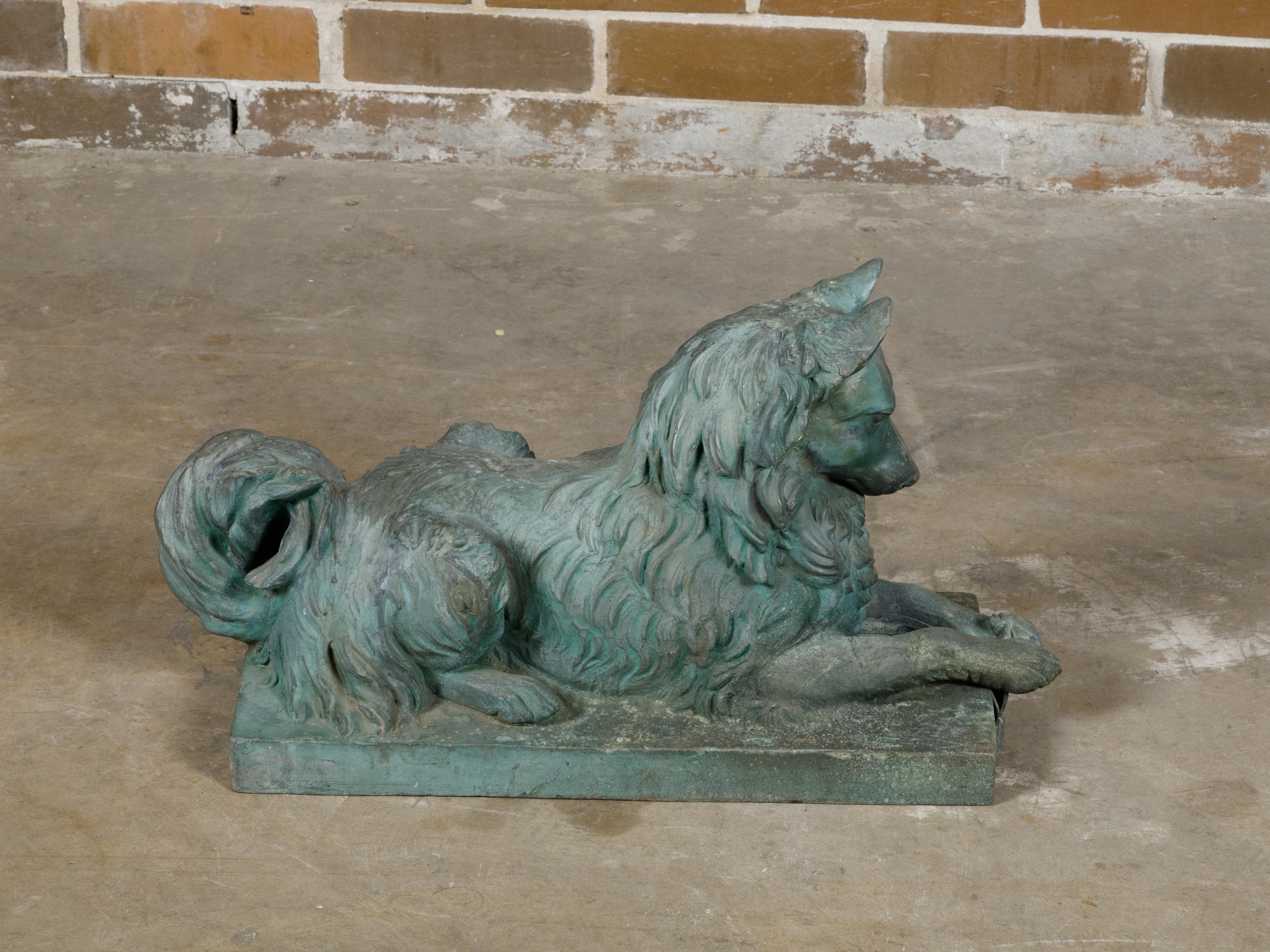 An American bronze statue of a dog by J.L. Mott Iron Works from the late 19th century with verdigris patina. This late 19th-century American bronze statue, crafted by the esteemed J L Mott Iron Works, captures the essence of timeless artistry
