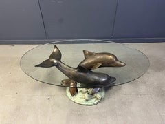 Bronze dolphin coffee table signed C Caudion, 1960s