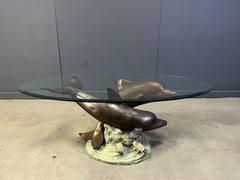 Bronze dolphin coffee table signed C Caudion, 1960s