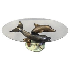 Bronze dolphin coffee table signed C Caudion, 1960s