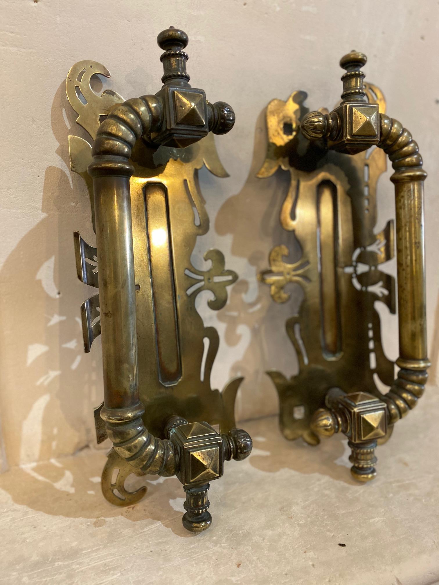 This pair of 19th century door handles are made of bronze and signed H. Dandois. 

Measurements: 16.5'' L x 6.5'' W x 3'' D.