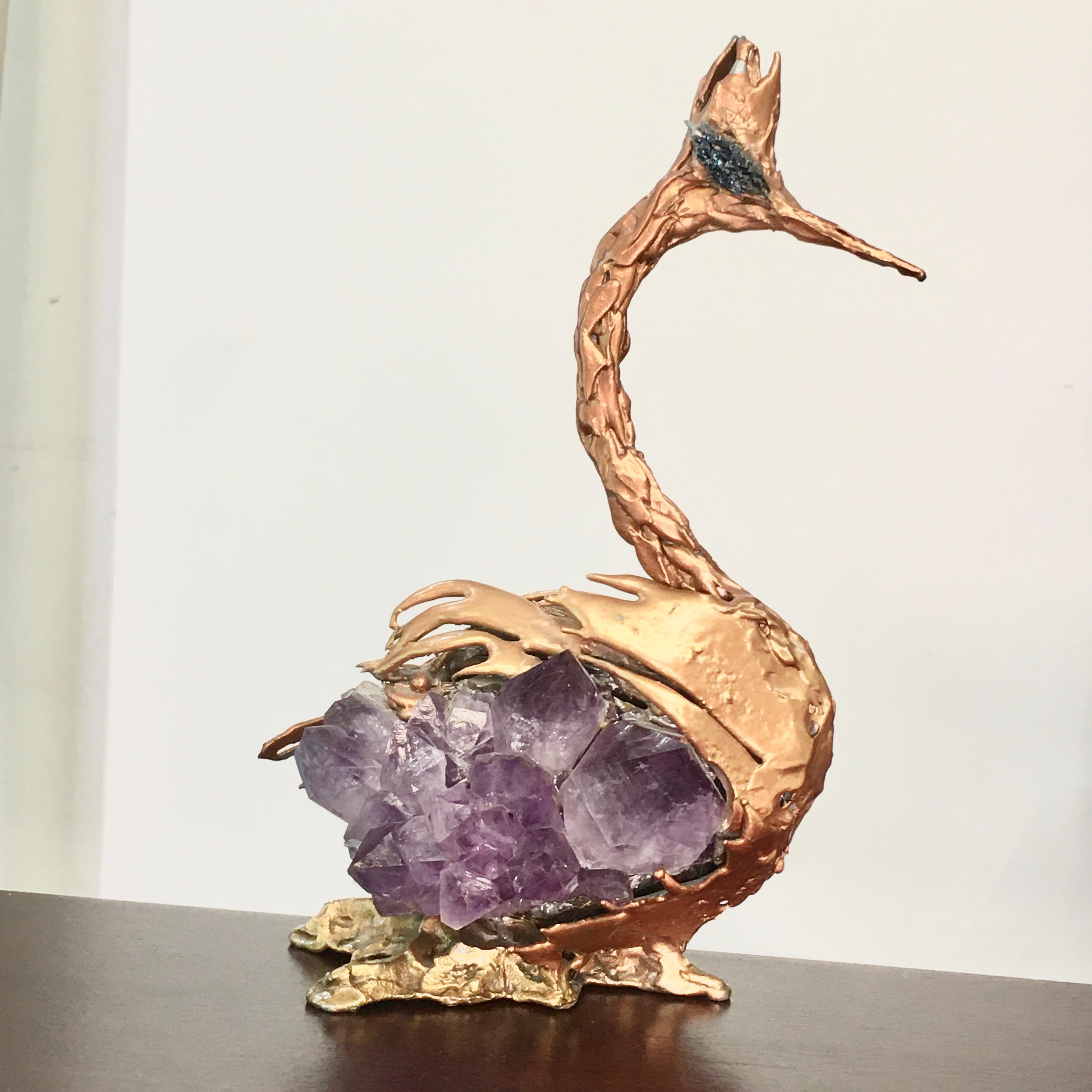 Exploded bronze dore sculpture of a heron encrusted with amethyst rock crystal and small blue mineral elements for eyes. (lapus lazuli?)
Faint marking on the underside. Indecipherable.
Initially I reached out to Claude Victor Boeltz who confirmed