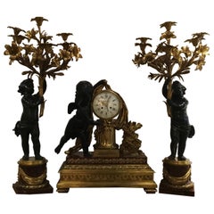 Garniture d'horloge en bronze doré et marbre rouge par Ferdinand Berthoud
