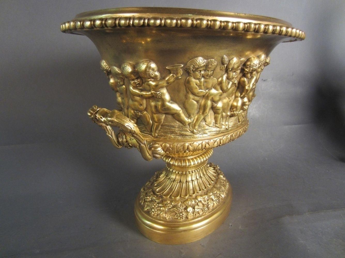 Bronze doré centerpiece/planter antique, finest quality 19th century. Antique gilt bronze figural centerpiece/ planter with sculpted swan head handles. Figural design in high relief around body of planter. Manor of Clodion, French, 19th century.