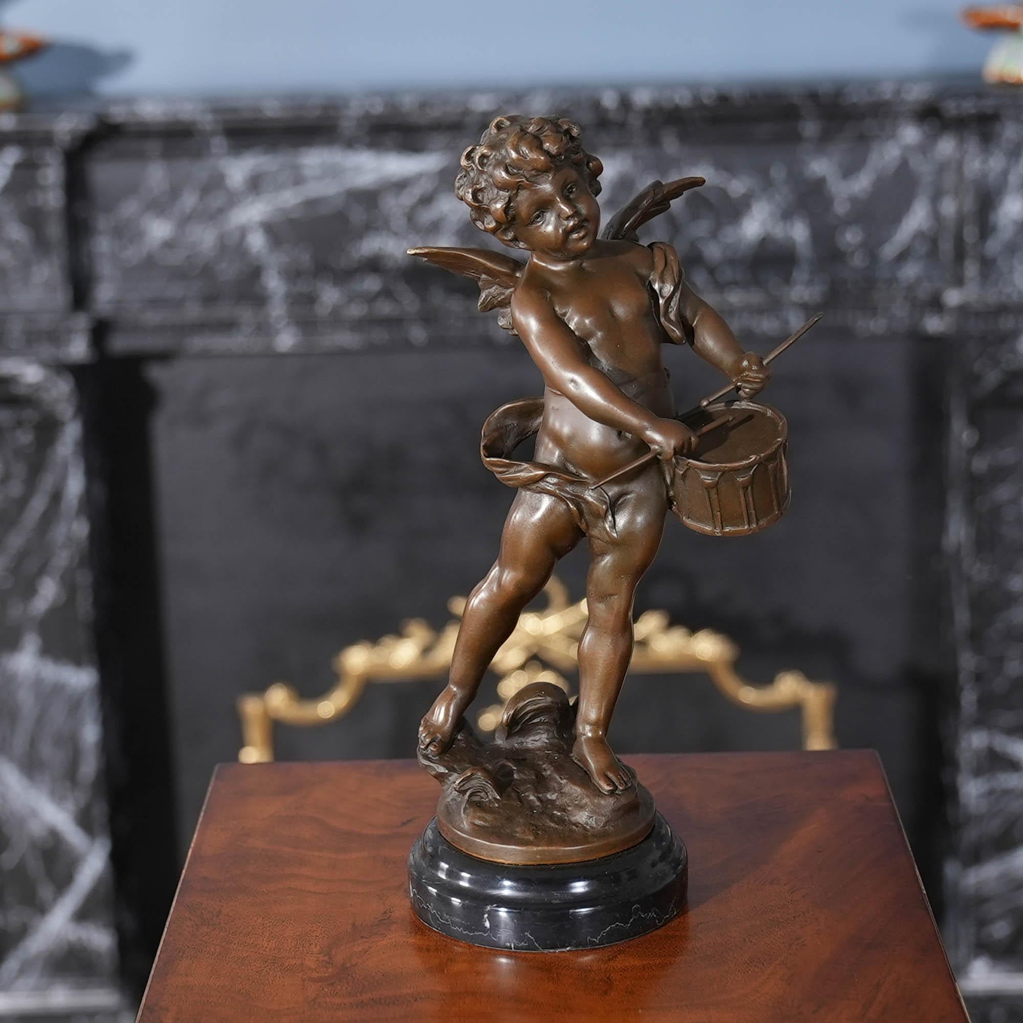 Beautiful even when standing still the Bronze Drummer Cherub on Marble Base is a striking addition to any setting. Using traditional lost wax casting methods the Bronze Drummer Cherub statue has hand chaised details added to give a high level of