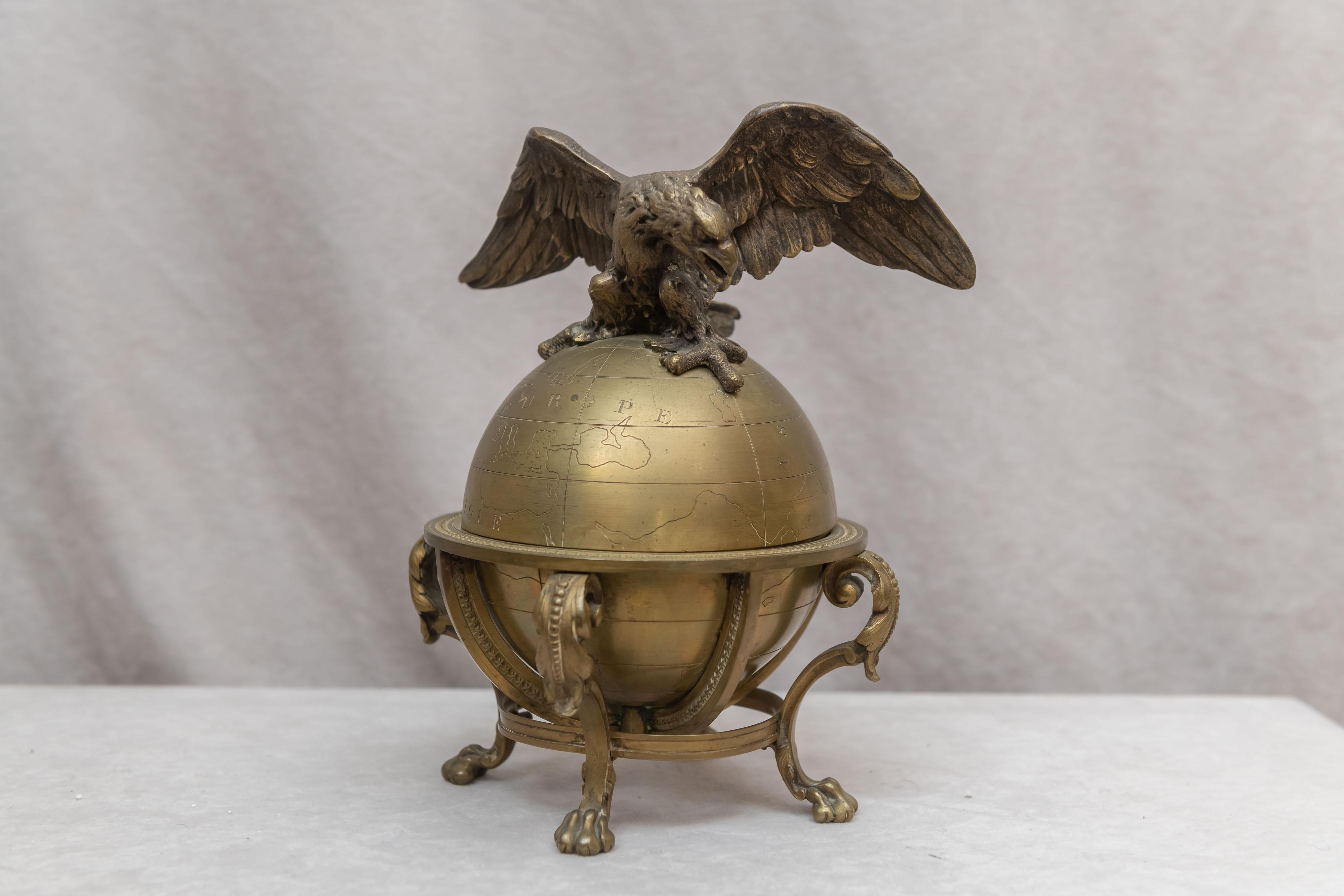 If you collect or like eagles and or globes, we found you a beauty. A very unusual well cast sculpture with amazingly the original glass insert for the ink. A subject you won't see everyday.