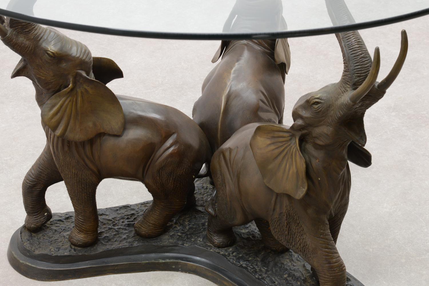 3 elephant table with glass top