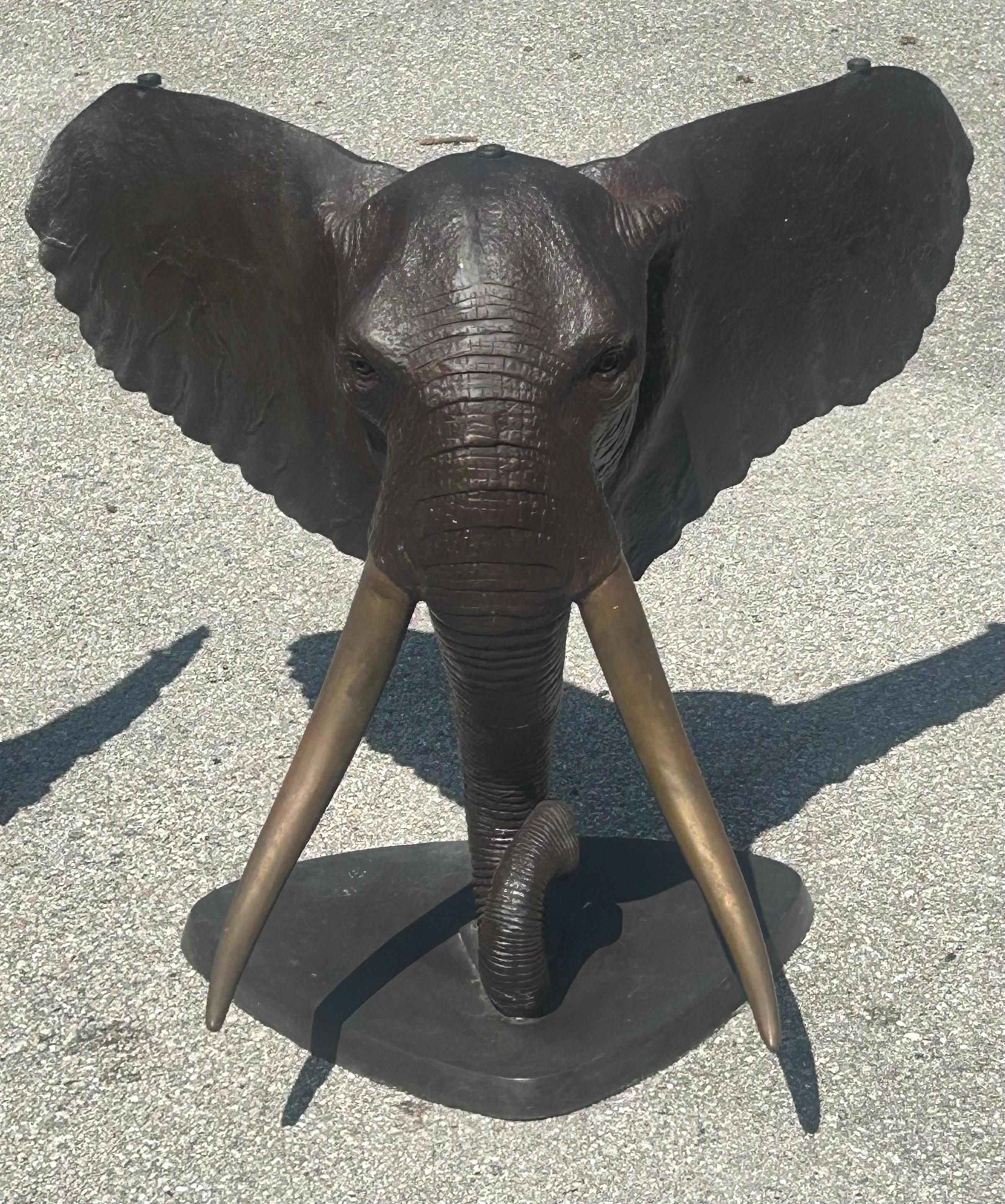Cast Bronze elephant table base. Two available For Sale