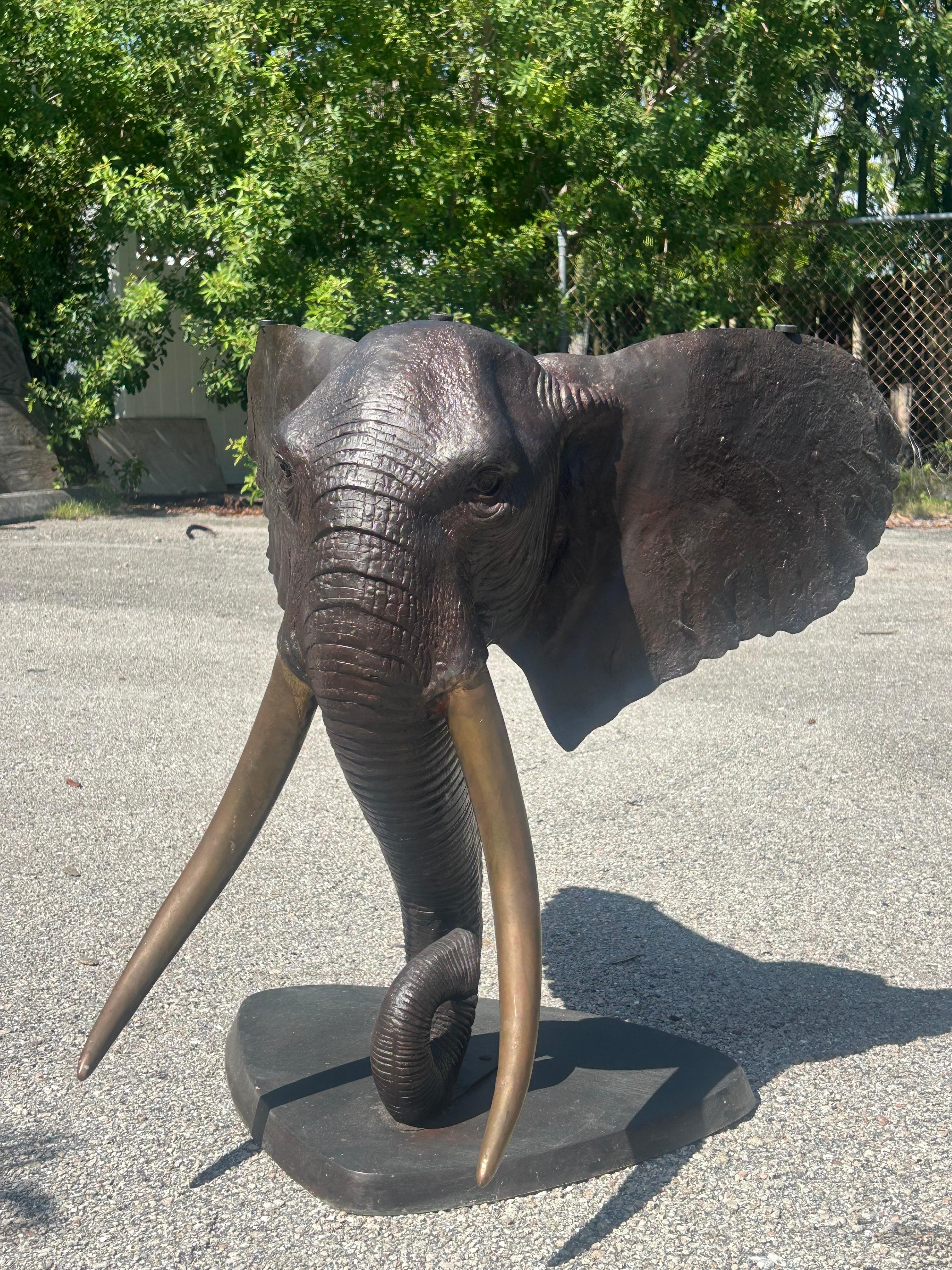 Bronze elephant table base. Two available In Good Condition For Sale In West Palm Beach, FL