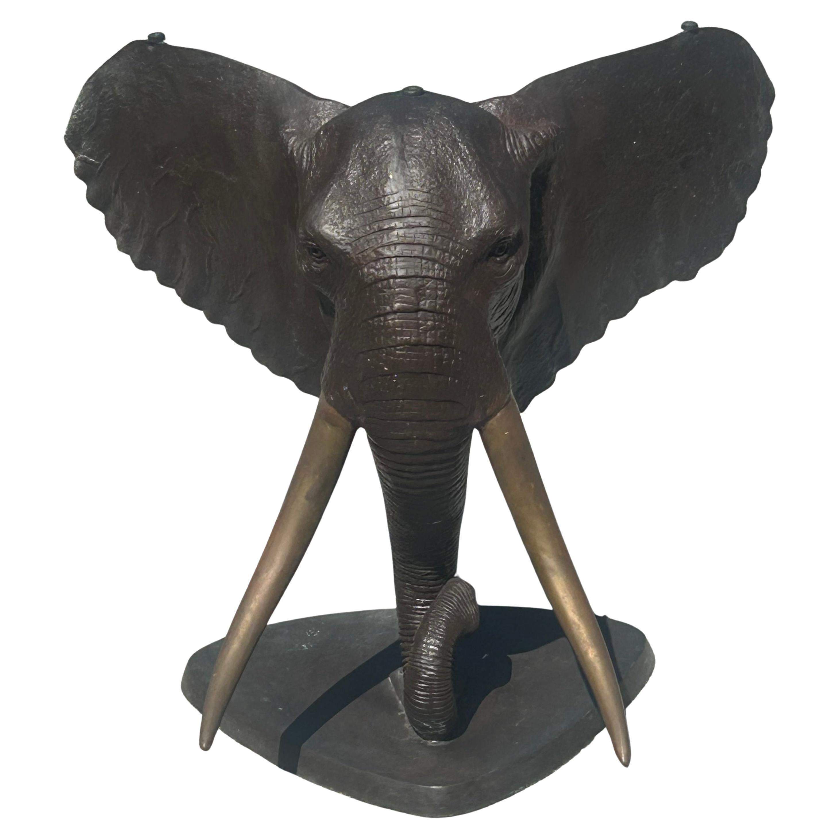 Bronze elephant table base. Two available For Sale
