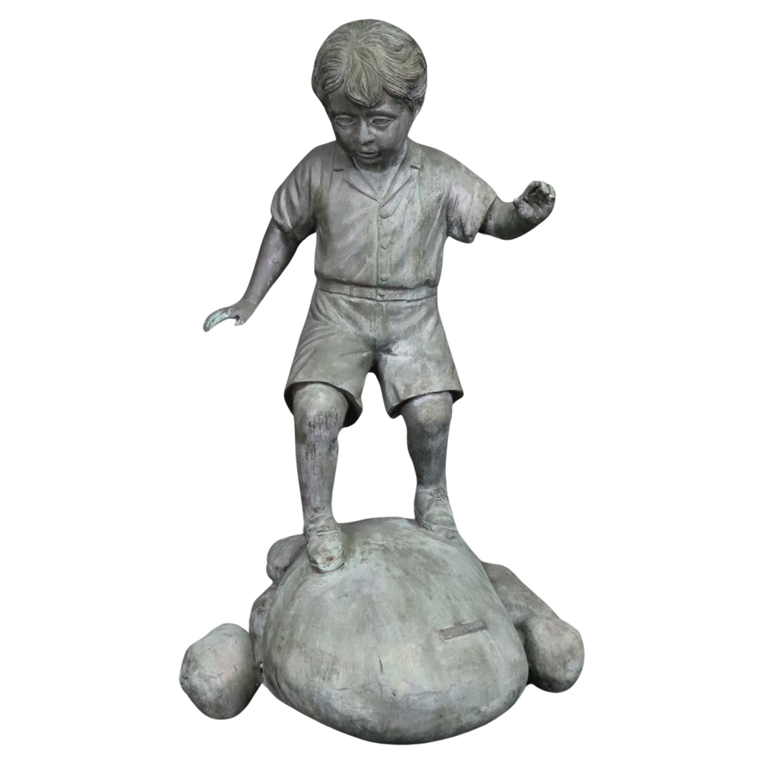 Bronze Elite by Henre in Verdi Gris Outdoor Statue of a Young Boy on a Rock For Sale