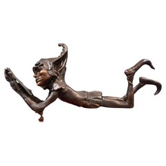 Statua di bronzo di Elph, fata celtica che legge e che si diverte a leggere