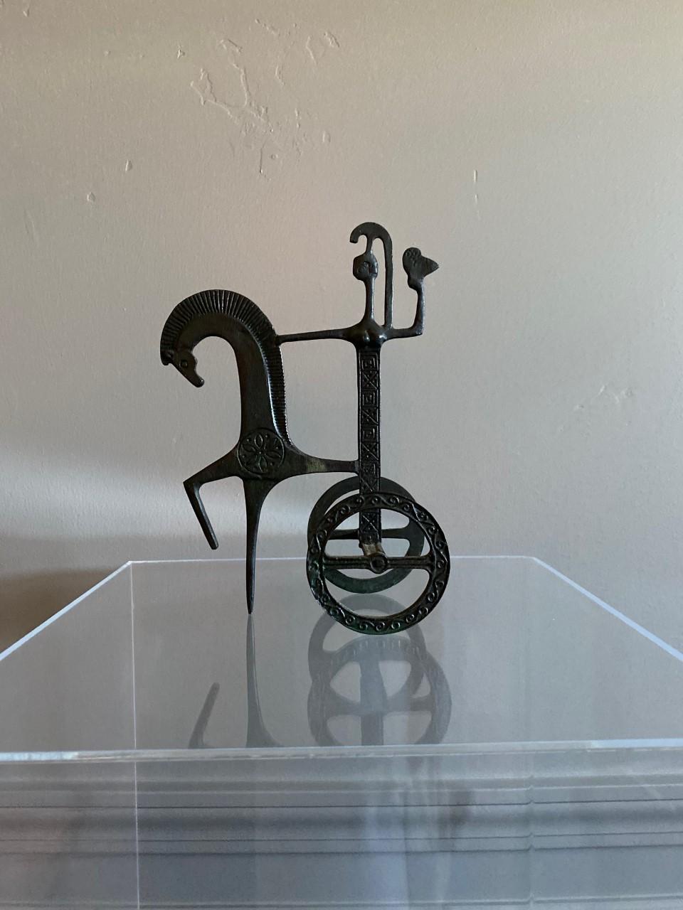 Simple and elegant Etruscan bronze horse and chariot sculpture in the style of Frederick Weinberg, circa 1970s. Minimalist and modern, this piece has nice etched detailing and is perfect for an office or mantel. The piece measures 5.5