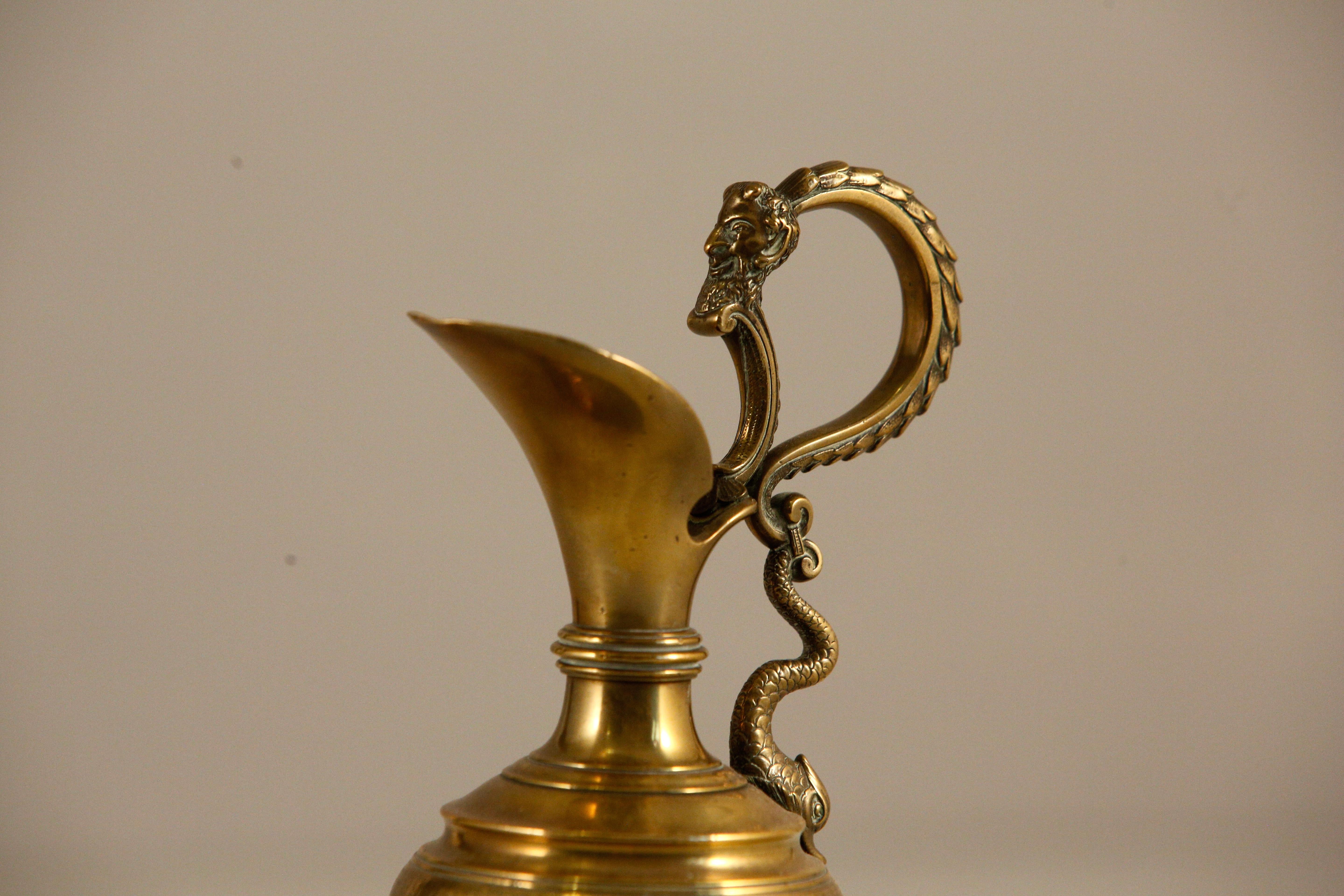 Renaissance Bronze Ewer Vase with Bacchus and Dolphin Figural Handle For Sale