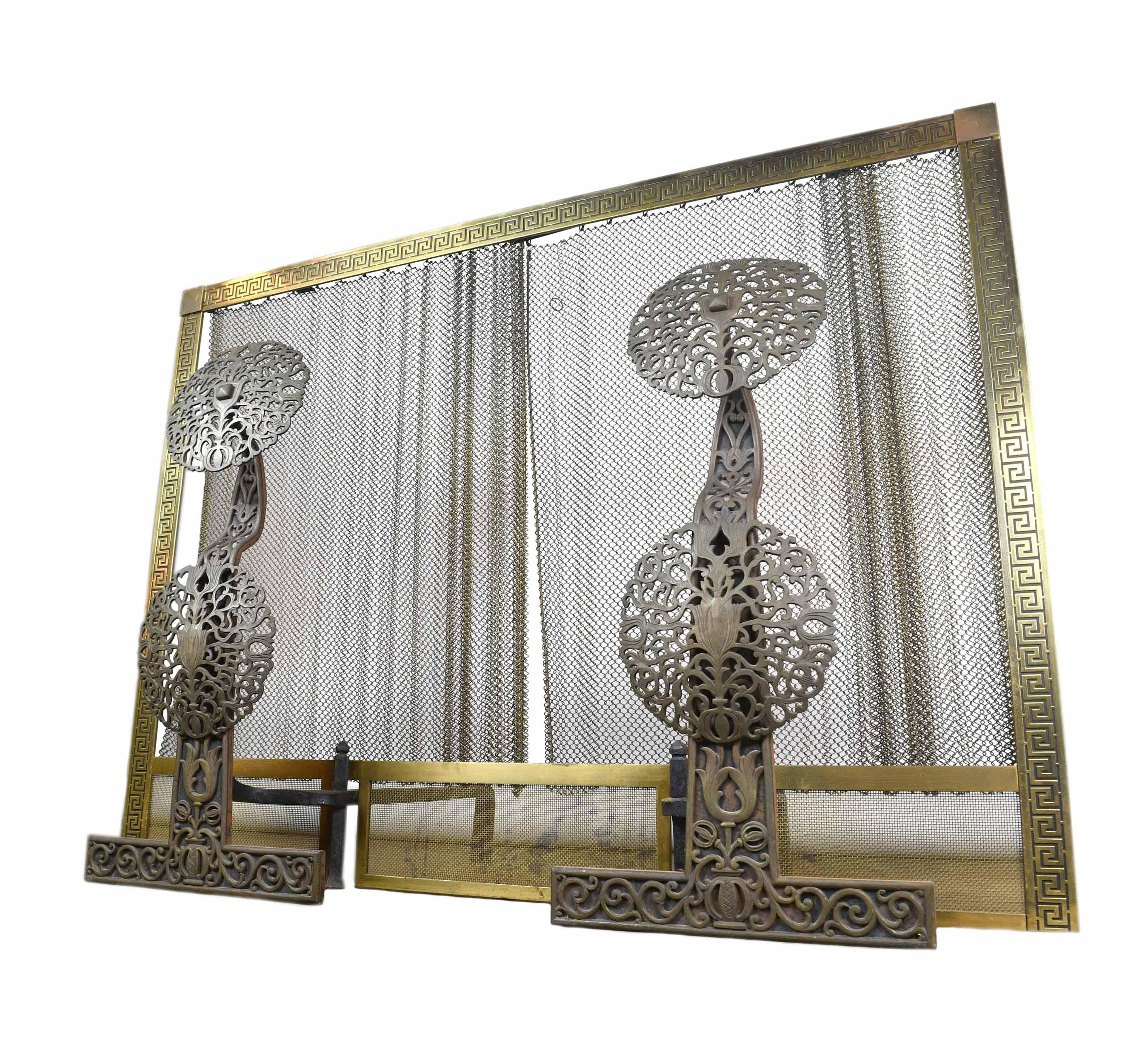 This stunningly crafted pair of andirons features intricate craftsmanship that needs to be seen to believe! Made of lovely bronze-faced iron, these andirons would bring great character to any space. Sold as a pair with a geometrically patterned