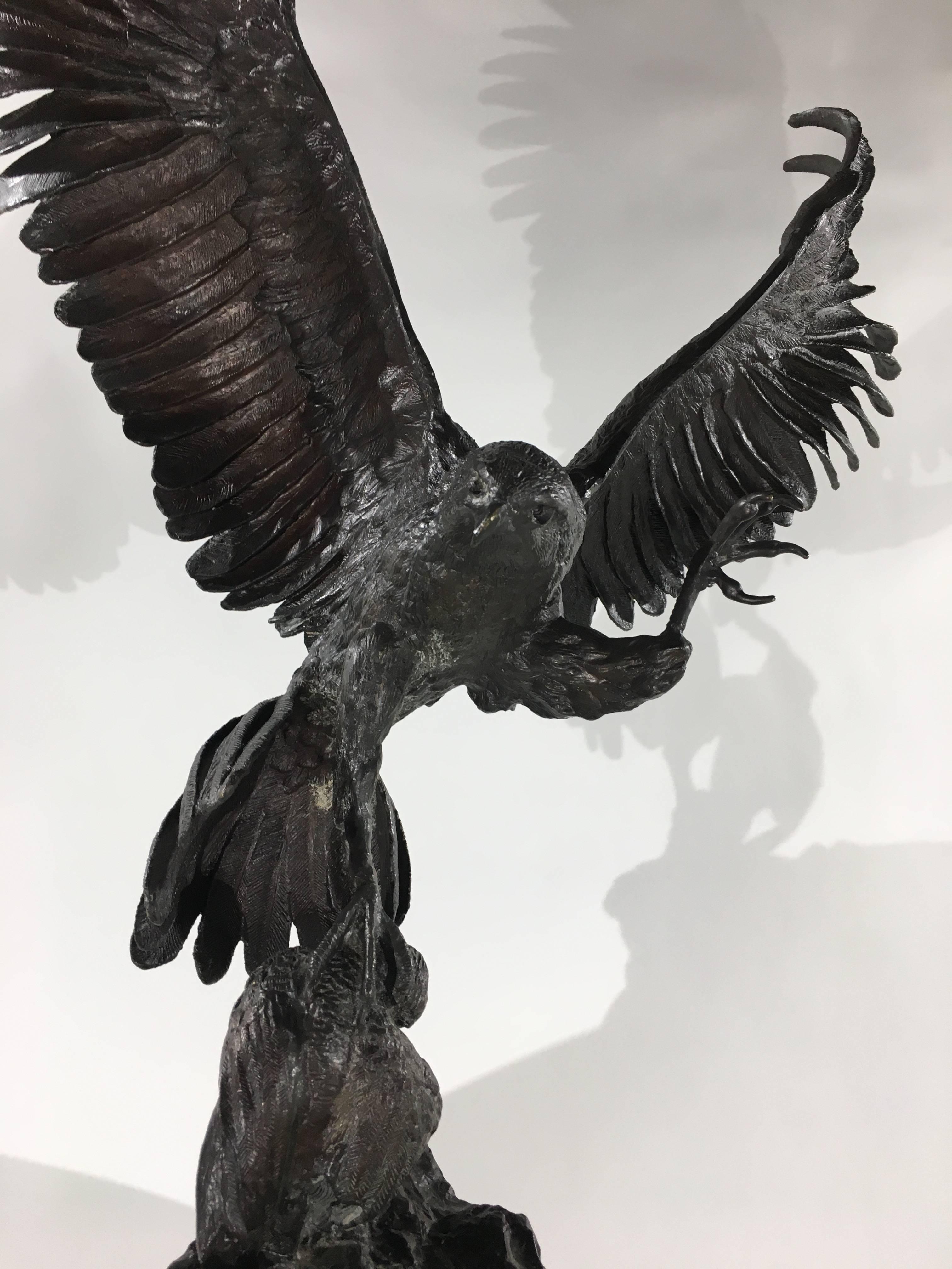 bronze falcon sculpture