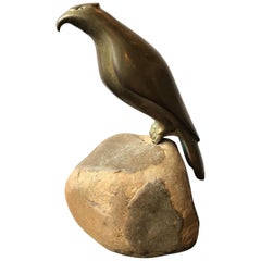 Bronze Falcon Sculpture on Rock