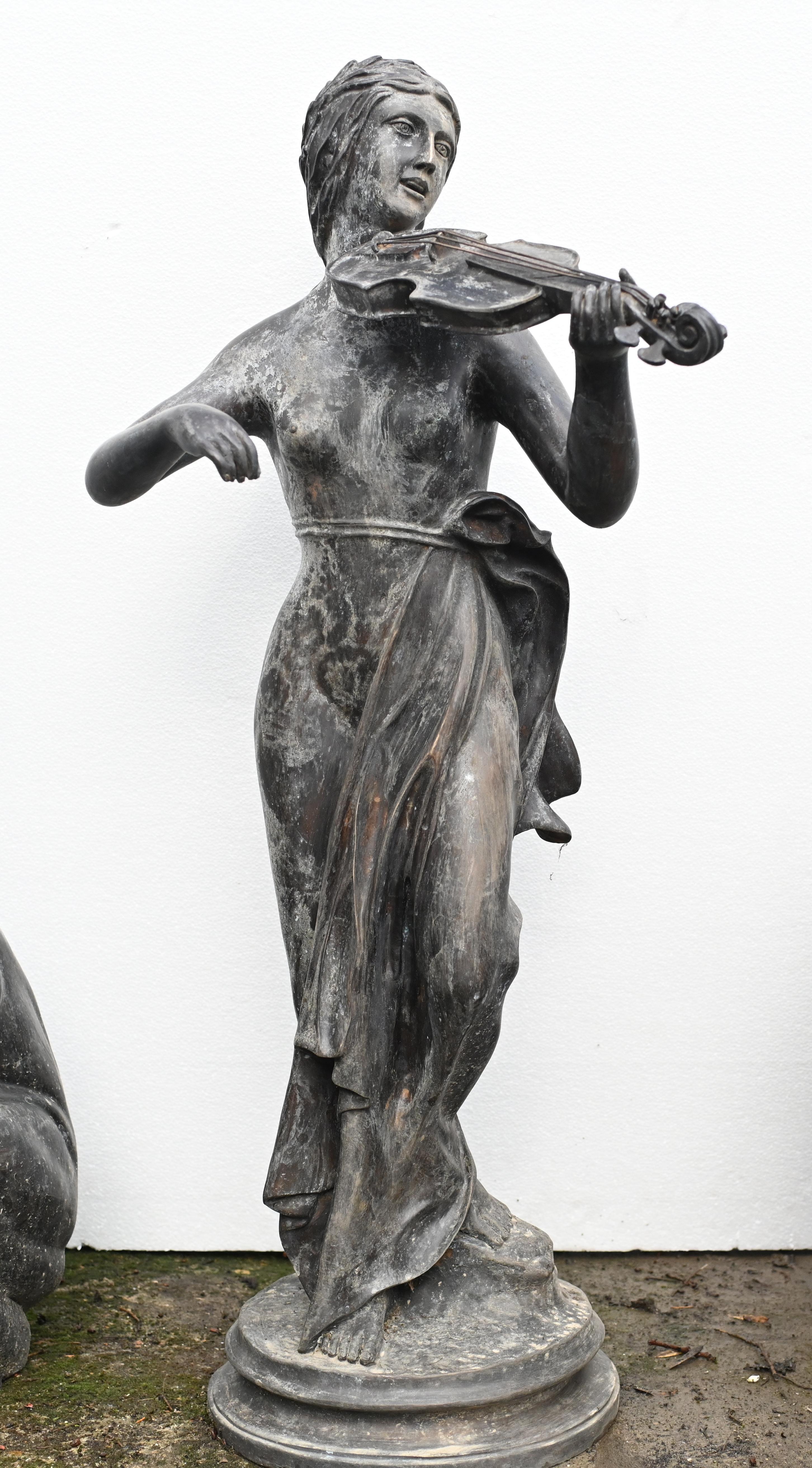 Classial Italian bronze statue depicting a toga clad female violinist
Over four feet tall - 104 CM - so good size
Would add an air of classical antiquity to any collection
Bought from a private house in London's Belgravia
Lovely patina to the bronze
