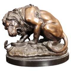 Bronze Figural Group of a Lion Fighting a Snake, 19th Century