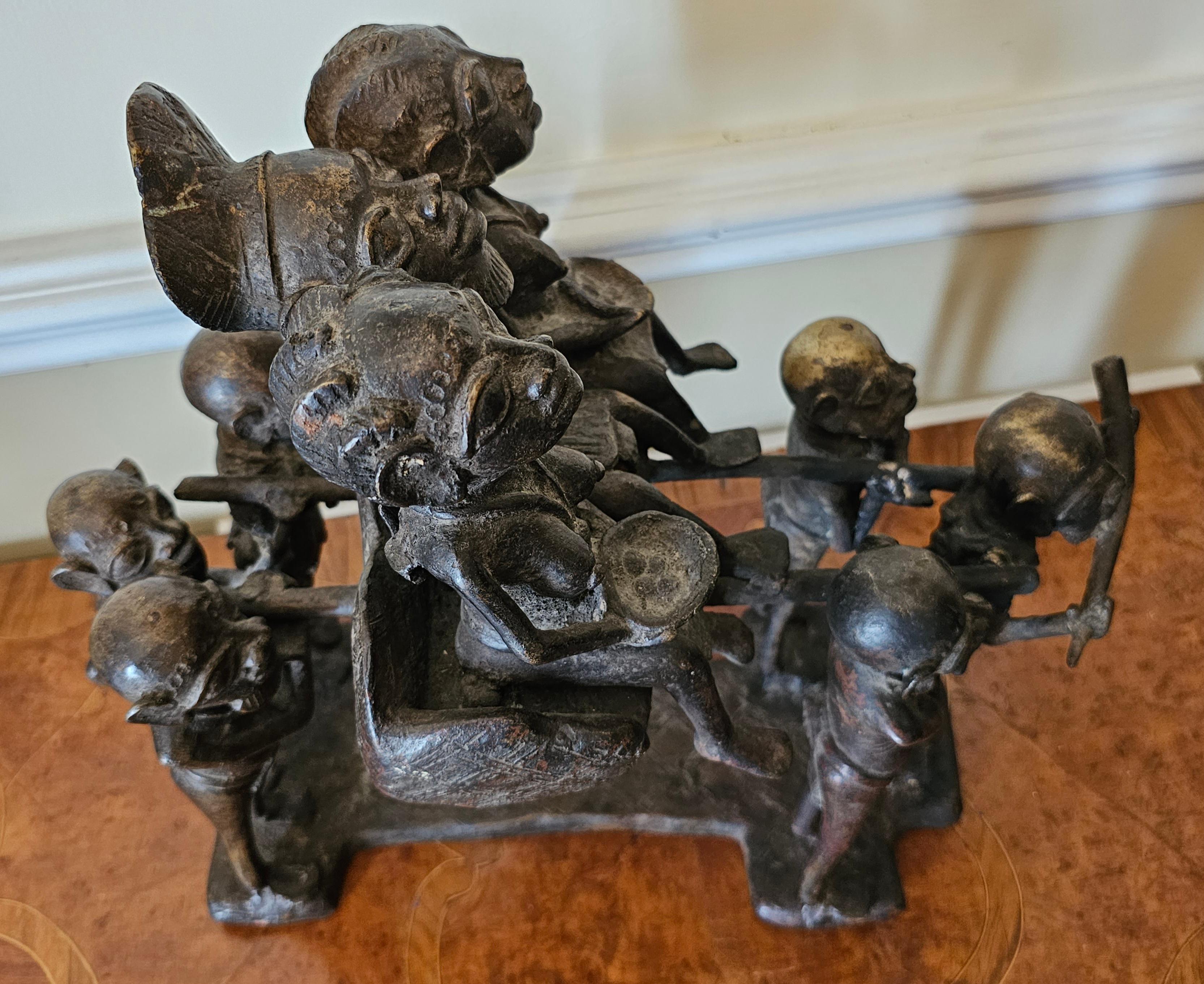 Bronze Figural Group Of African Royal Family On Carrier And Attendants, C. 1920s In Fair Condition For Sale In Germantown, MD