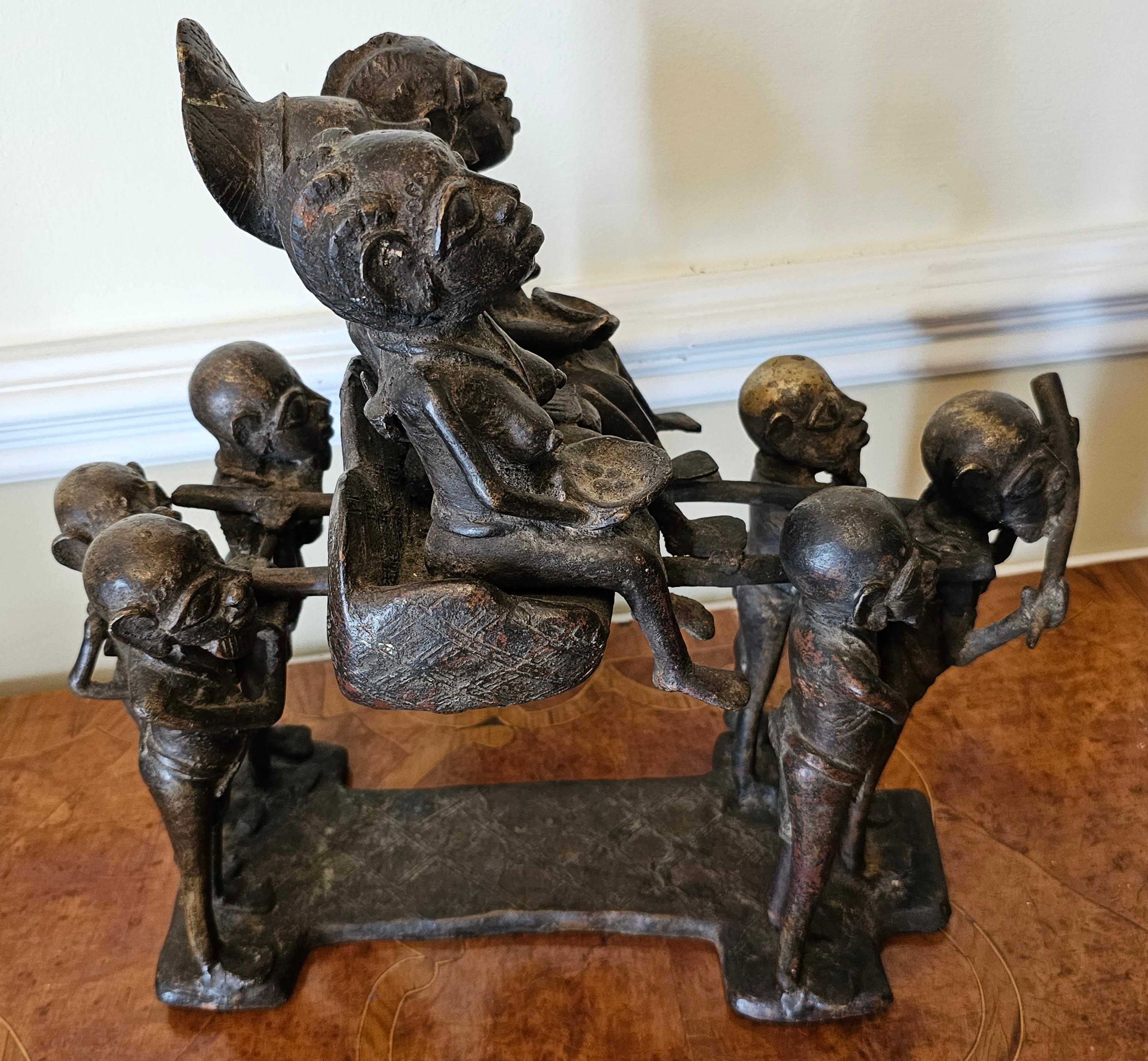 20th Century Bronze Figural Group Of African Royal Family On Carrier And Attendants, C. 1920s For Sale