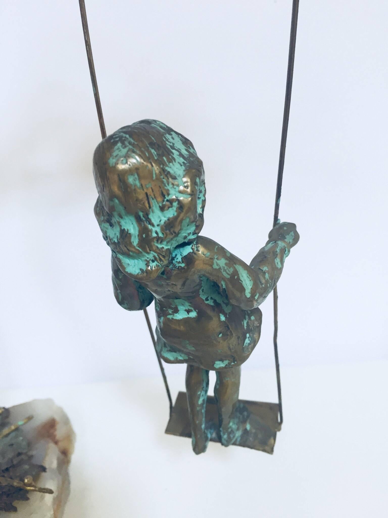 Brutalist Bronze Figural Sculpted Girl Swinging from a Tree Branch on Marble Rock Base