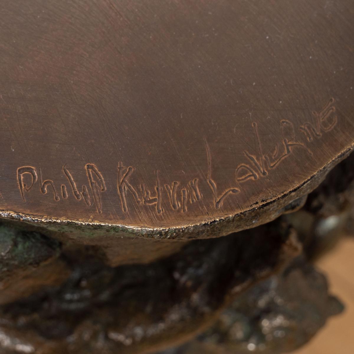 Bronze figural side table by Philip and Kelvin LaVerne.