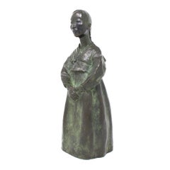 Figure en bronze d'une jeune fille coréenne par Eudald SERRA i Güell, vers 1940.