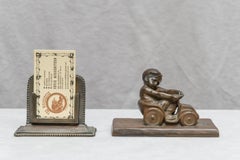 Bronze Figure of a Little Boy in a Toy Car, Artist Signed Tereszczuk, circa 1910