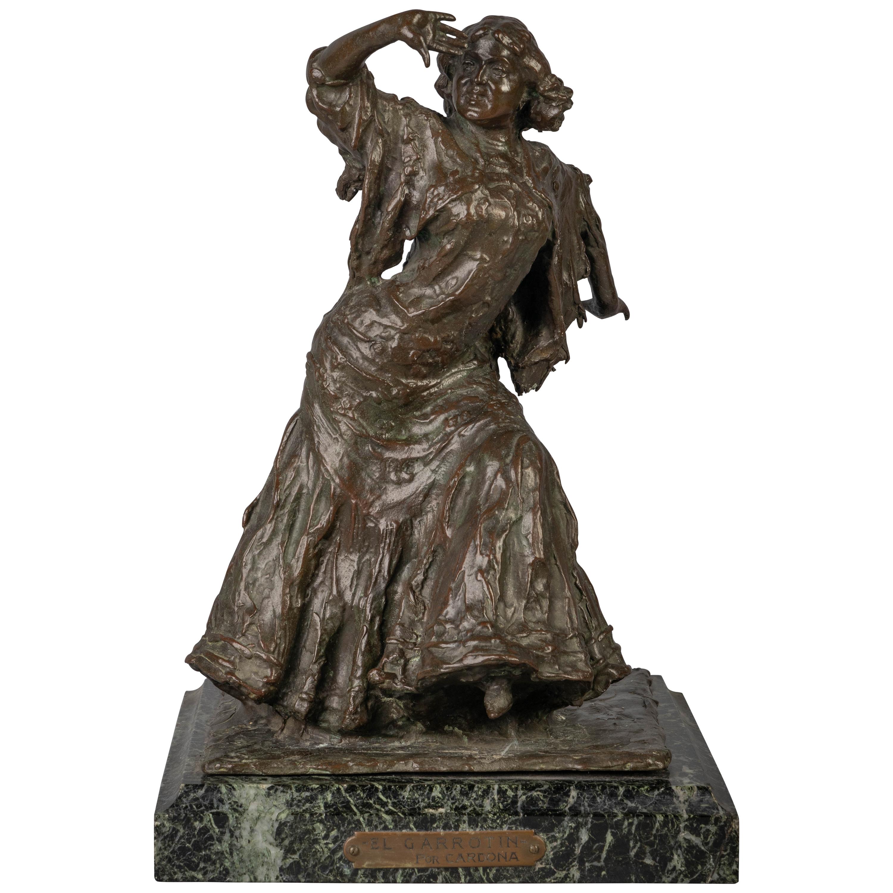 Figura de bronce de una bailarina española titulada "El Garrotin"