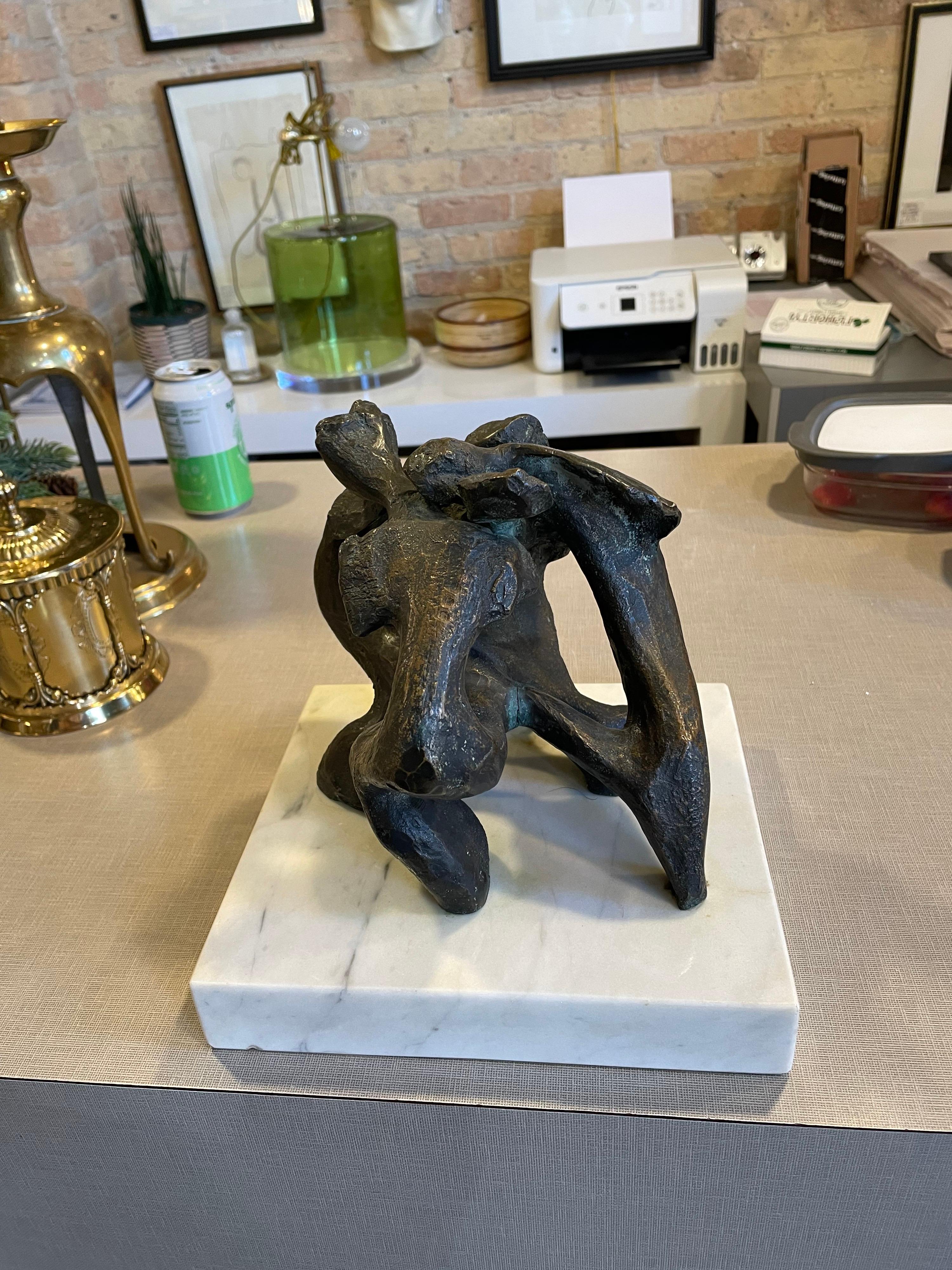 This is a wonderful heavy Bronze figural sculpture on a white marble plynth 
It is unsigned but attributed to the style of Abbott Pattison Chicago born sculptor.