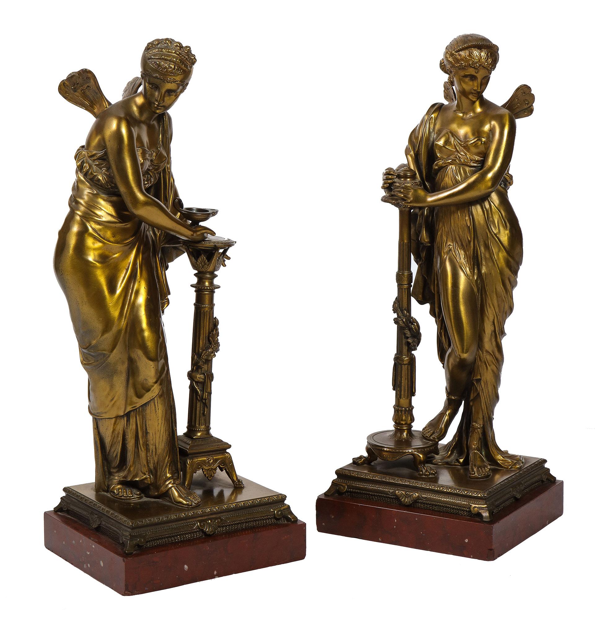 Each figure beautifully cast and chased bronze on a Rosso Antico base.