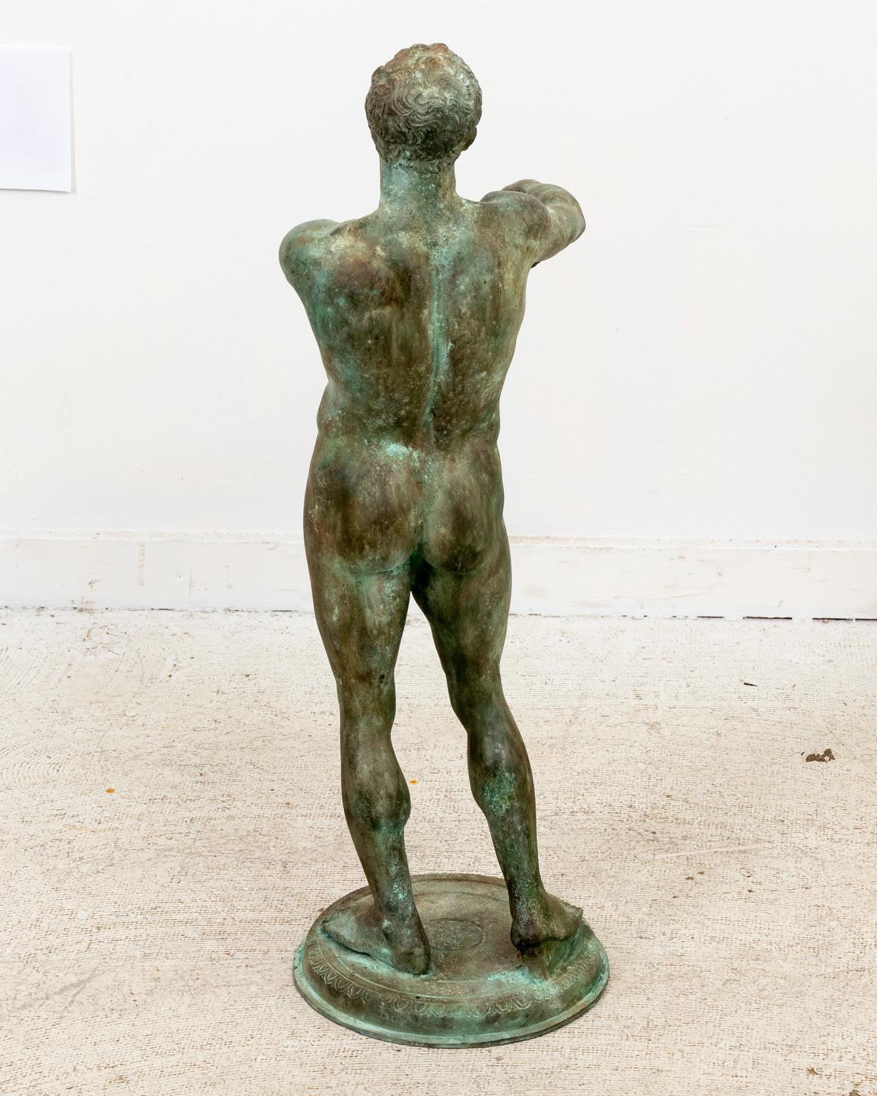 Bronze male figurine in a Roman style for decorative use. Please note of wear consistent with age.