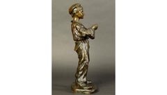 Bronze Figurine of Young Boy Rolling a Cigarette Jose Cardona 20th Century