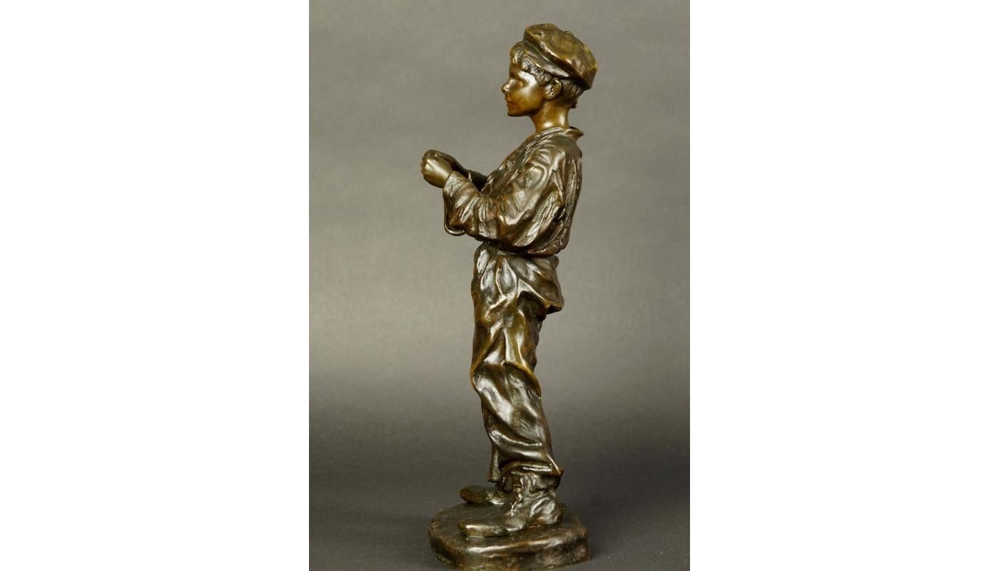 Patinated Bronze Figurine of Young Boy Rolling a Cigarette Jose Cardona 20th Century For Sale