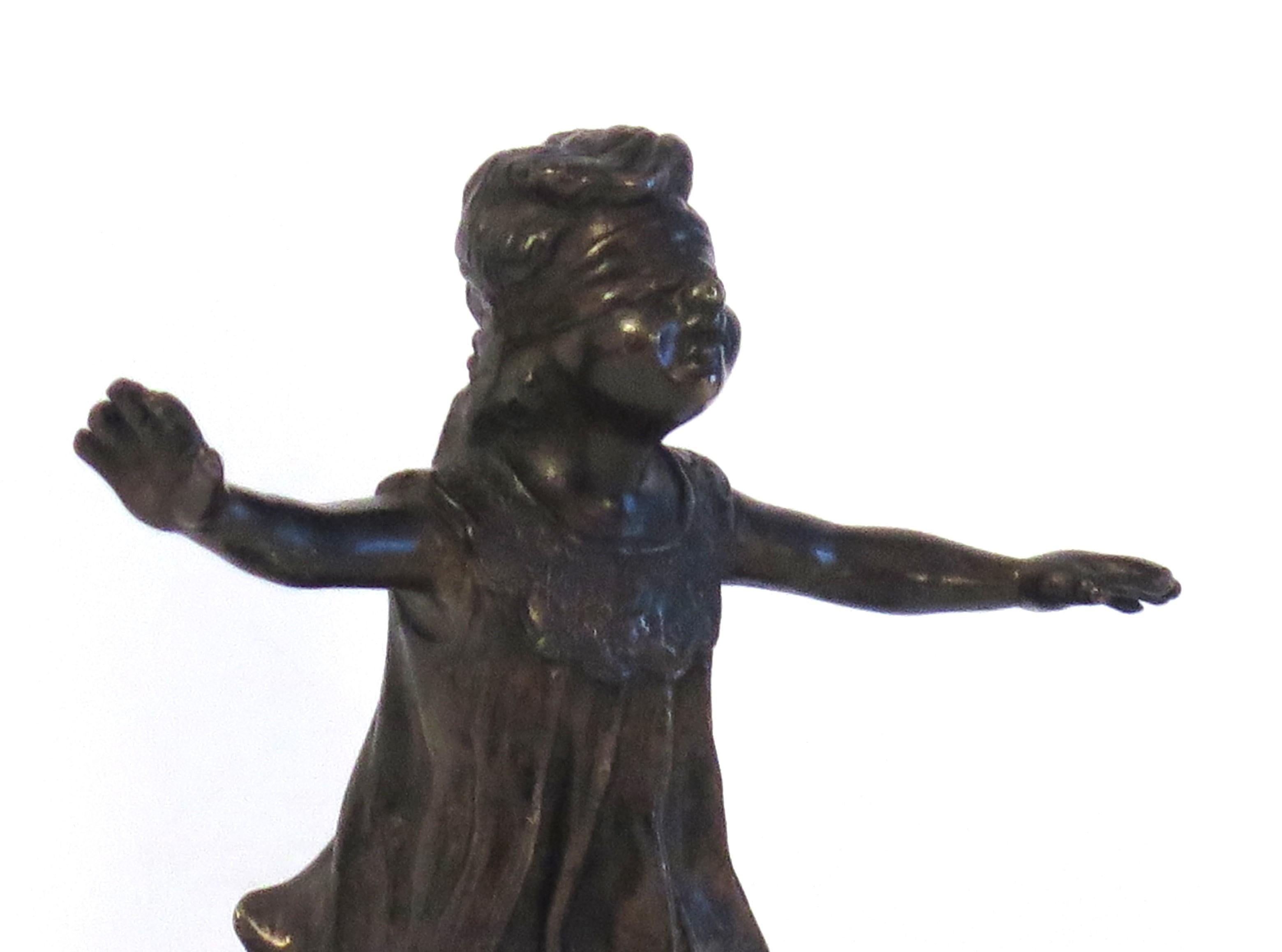 This is a solid bronze figurine of a young Girl with a blindfold playing Hide and Seek, which we attribute to the Italian sculptor Giuseppe Ferrari ( Ferrara , 1804 - Ferrara , 1884 ) this piece being made in the last quarter of the 19th