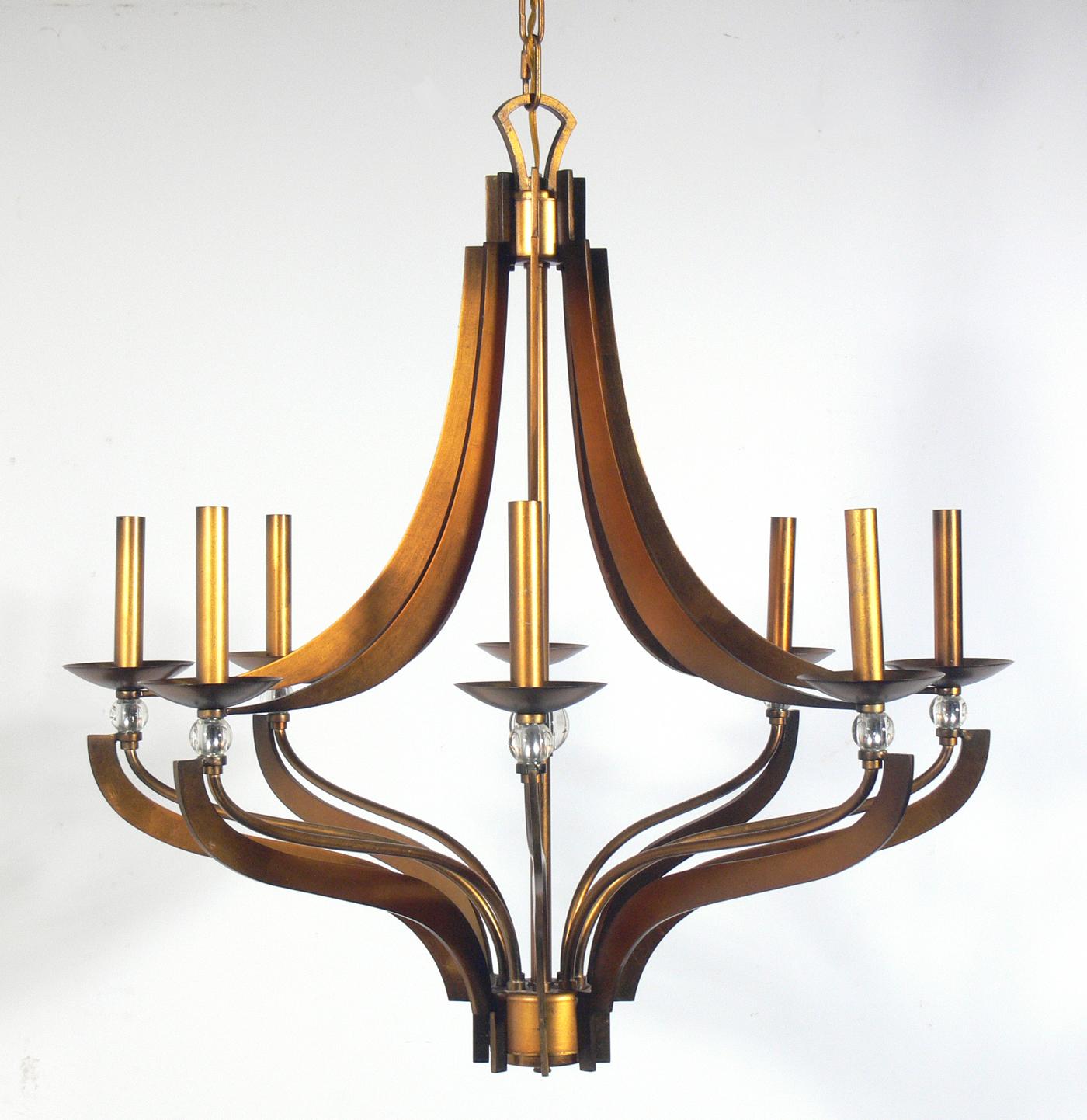 Bronze finished and crystal chandelier, probably American, circa 1990s. The bronze finished metal retains its warm original patina.