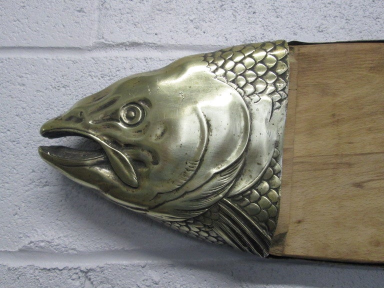 Unique bronze fish cutting or cheese board or platter. Has original patina, original maple board and has a nice size.
