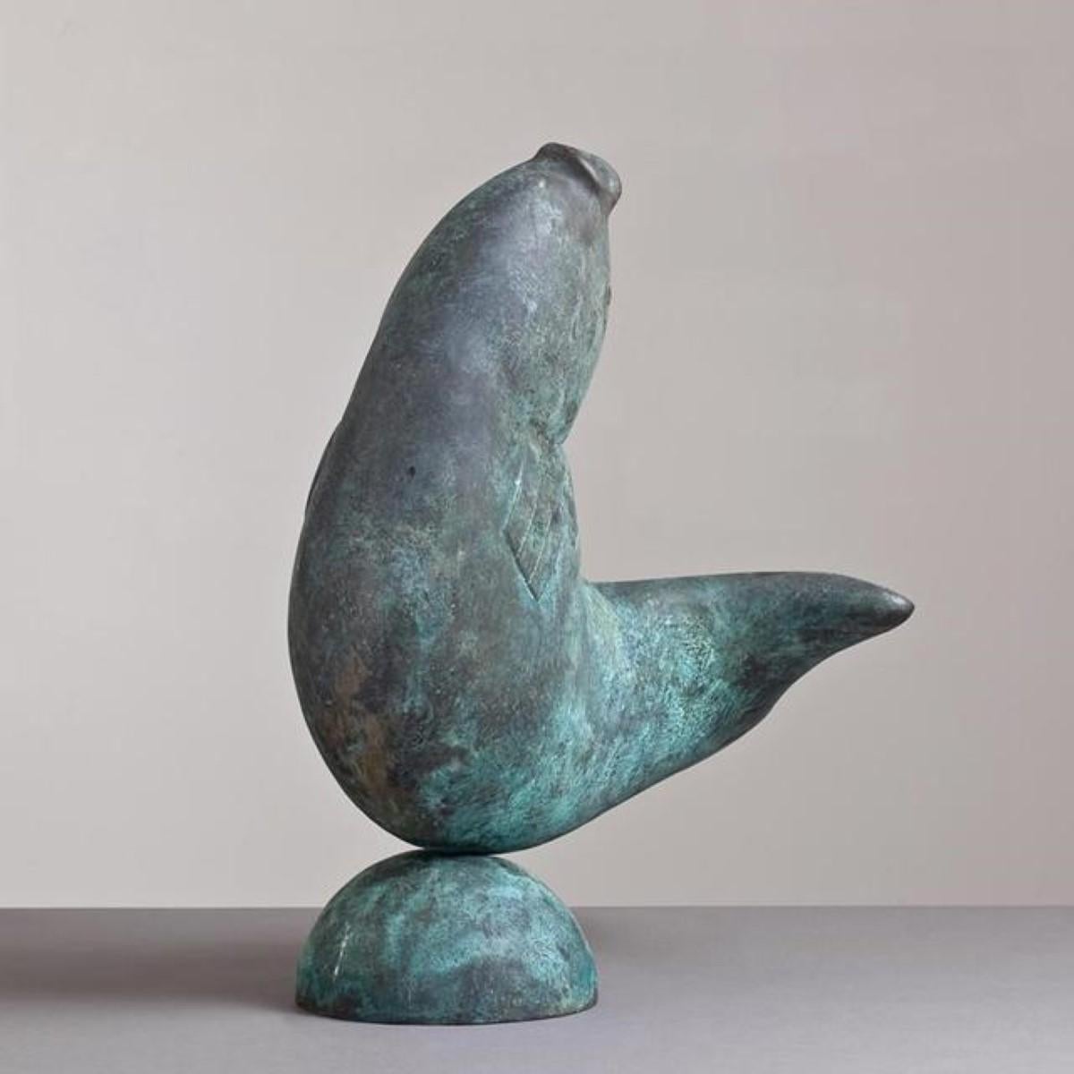 A bronze fish sculpture with an excellent verdigris patina, after Willy Kreitz.

Willy Kreitz (1903-1982) was a Belgium sculptor, who was very important in Belgium during his working years. THe smooth lines and detail of the fish are beautifully