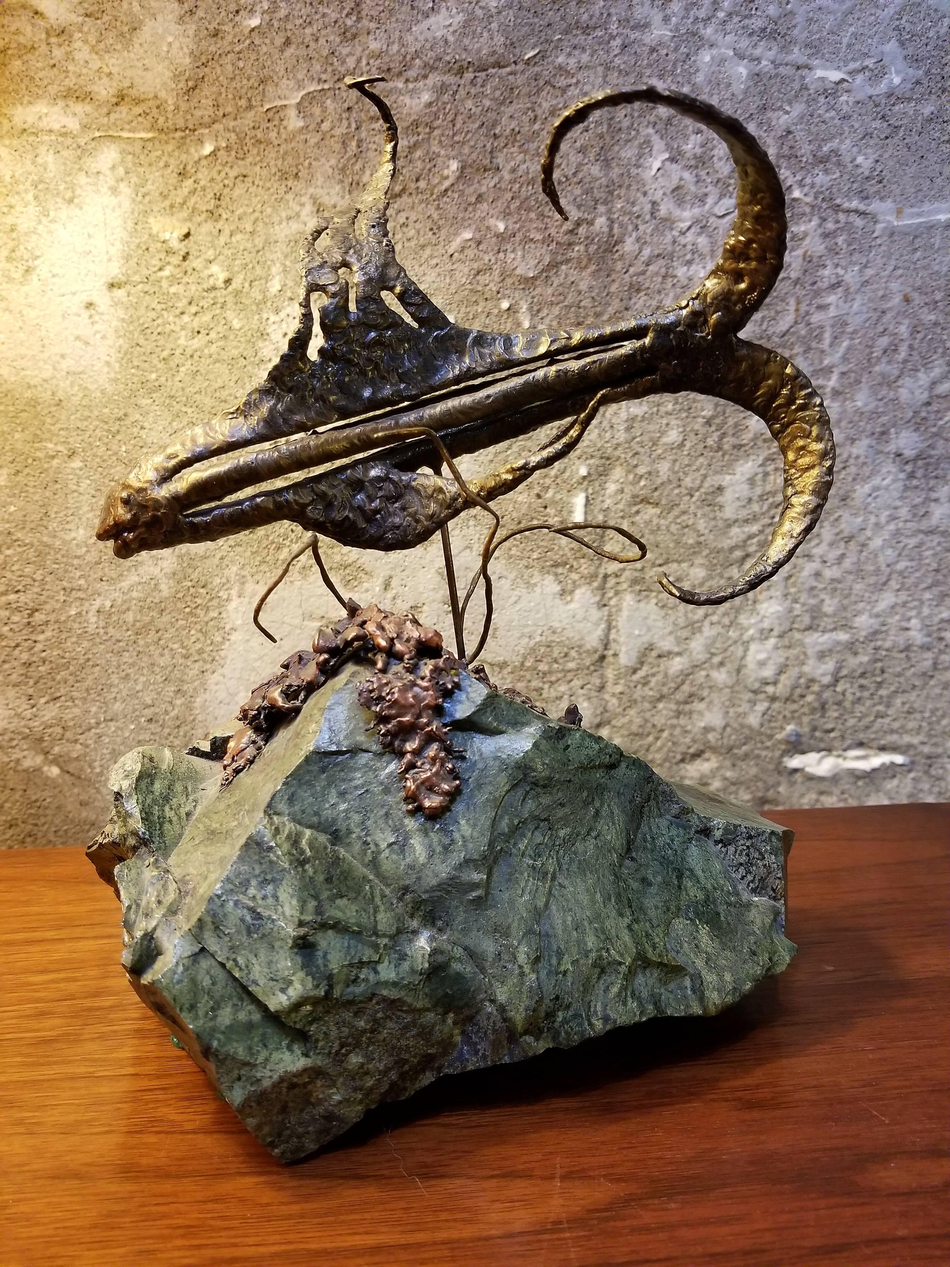 Brutalist Mid-Century Modern bronze sculpture of a stylized fish or serpent. Bronze and copper on a stone mount. Signed and dated 1972.