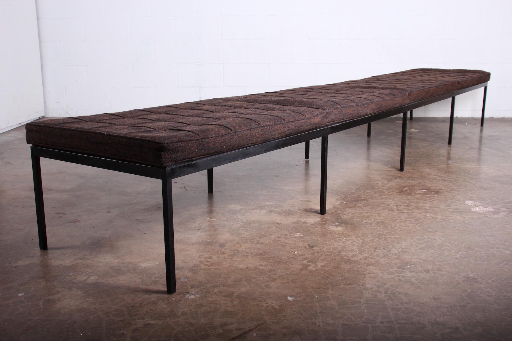 An early and rare bronze museum bench designed by Florence Knoll for Knoll. This 12 foot bench is wider than the standard Knoll benches as well.