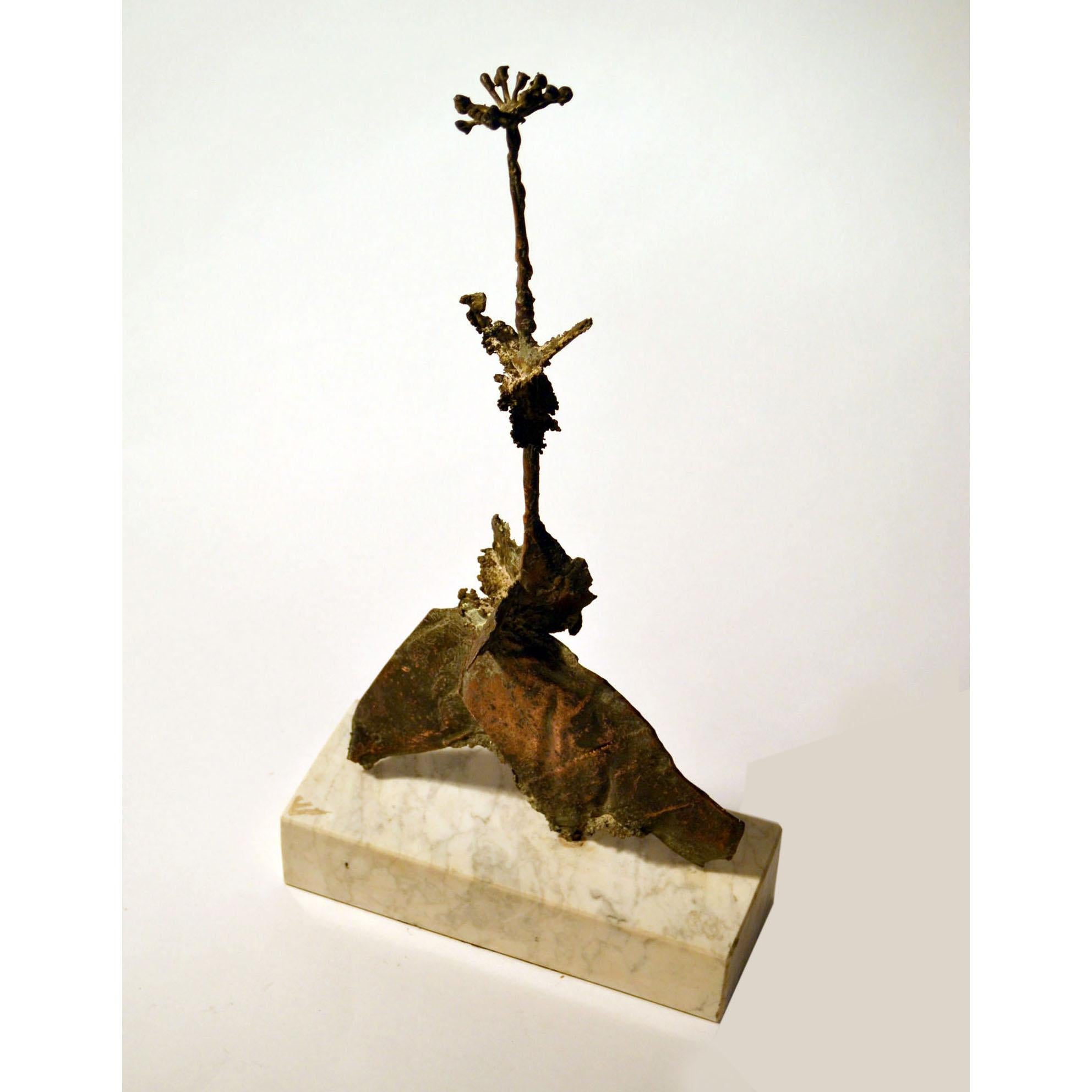 Brutalist bronze sculpture of a dried flower on marble base.