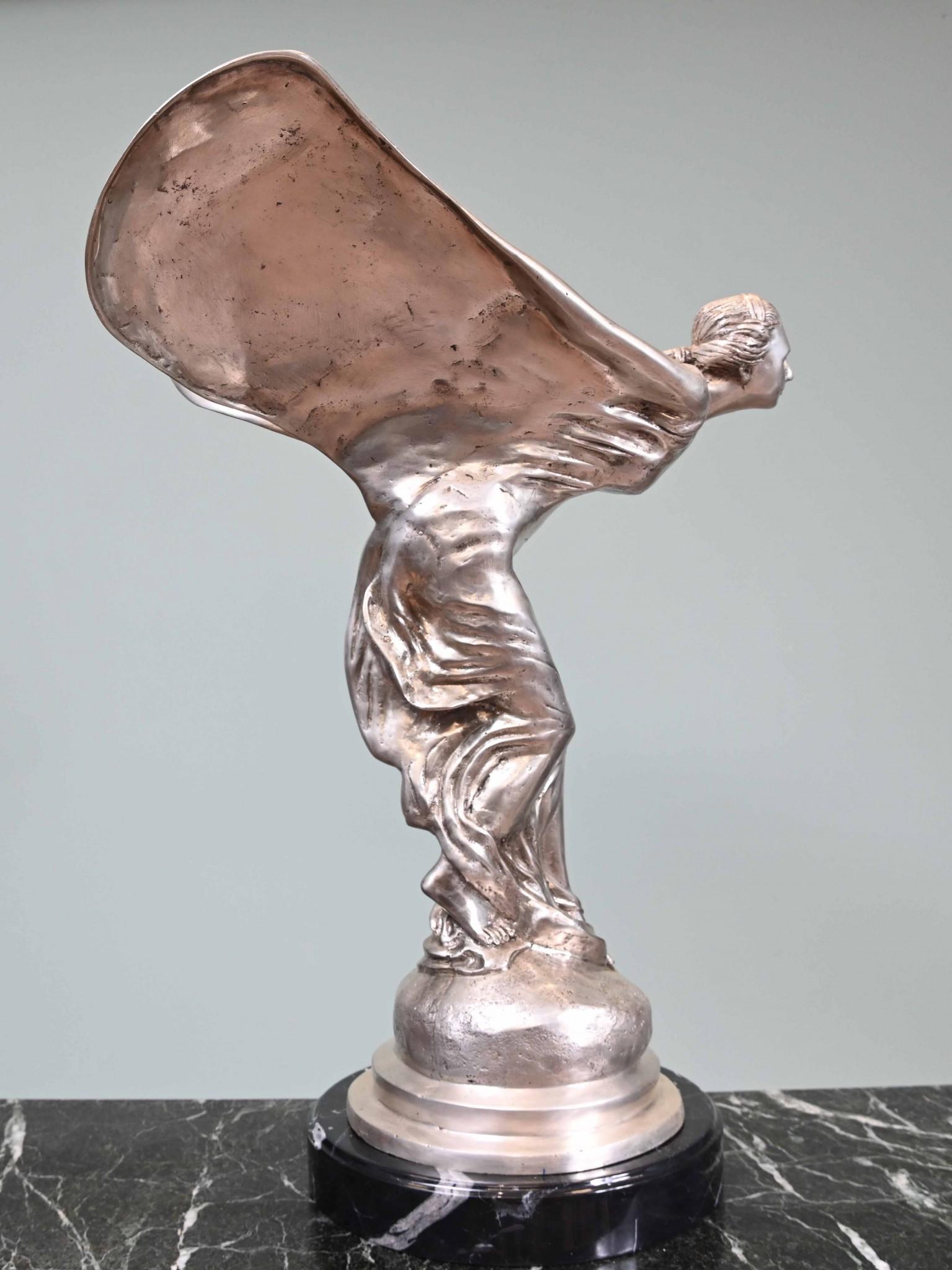 Gorgeous art nouveau style bronze rendition of the Flying Lady
Also referred to as the Spirit of Ecstacy and the original is by Charles Skyes (this is a later recasting from the original)
Of course most people will be familiar with this from the