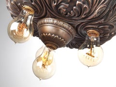 Monture encastre de thtre quatre ampoules, bronze