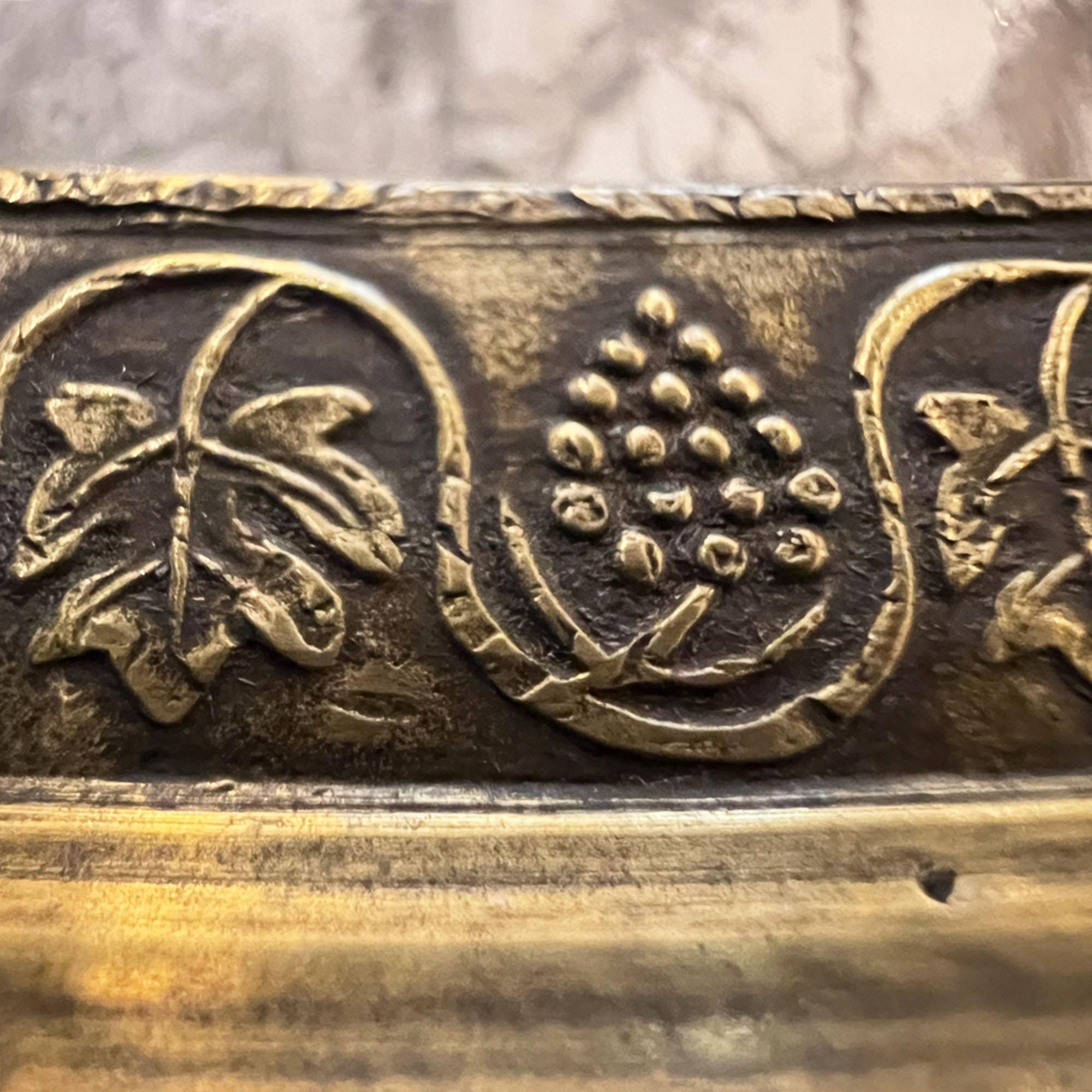 This superb large bronze surtout de table was made in France circa 1890.  Please have a look at all our pictures to see the intricate grape vine and flower detail around the edge more closely.

This is a really gorgeous centrepiece for the dining