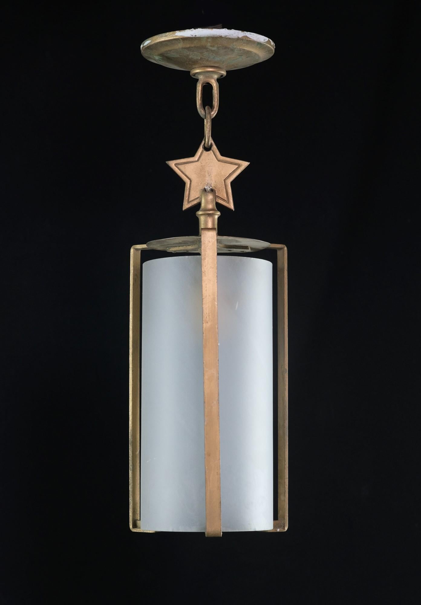 Mid-Century Modern pendant light lantern. Frame is bronze with a simple star detail. The frosted cylinder etched glass shade is original. The chain can be lengthened upon request. Cleaned and rewired. Small quantity available at time of posting.