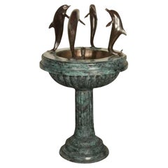 Fontaine de jardin en bronze avec dauphins