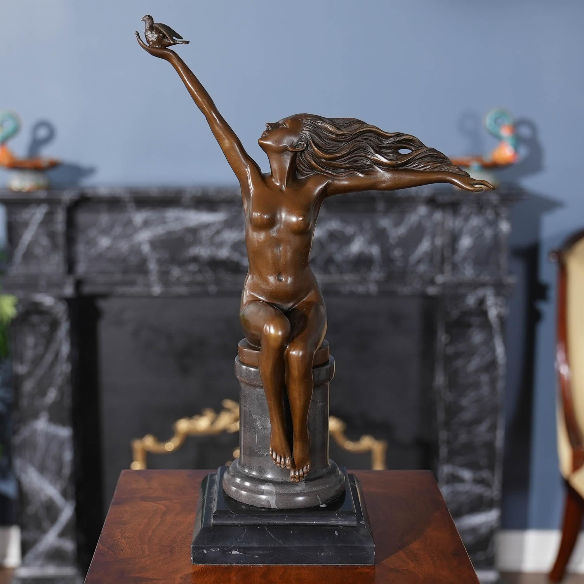 Graceful even when standing still the Bronze Girl with Bird on Marble Base is a striking addition to any setting. Using traditional lost wax casting methods the Bronze Girl with Bird statue has hand chaised details added to give a high level of