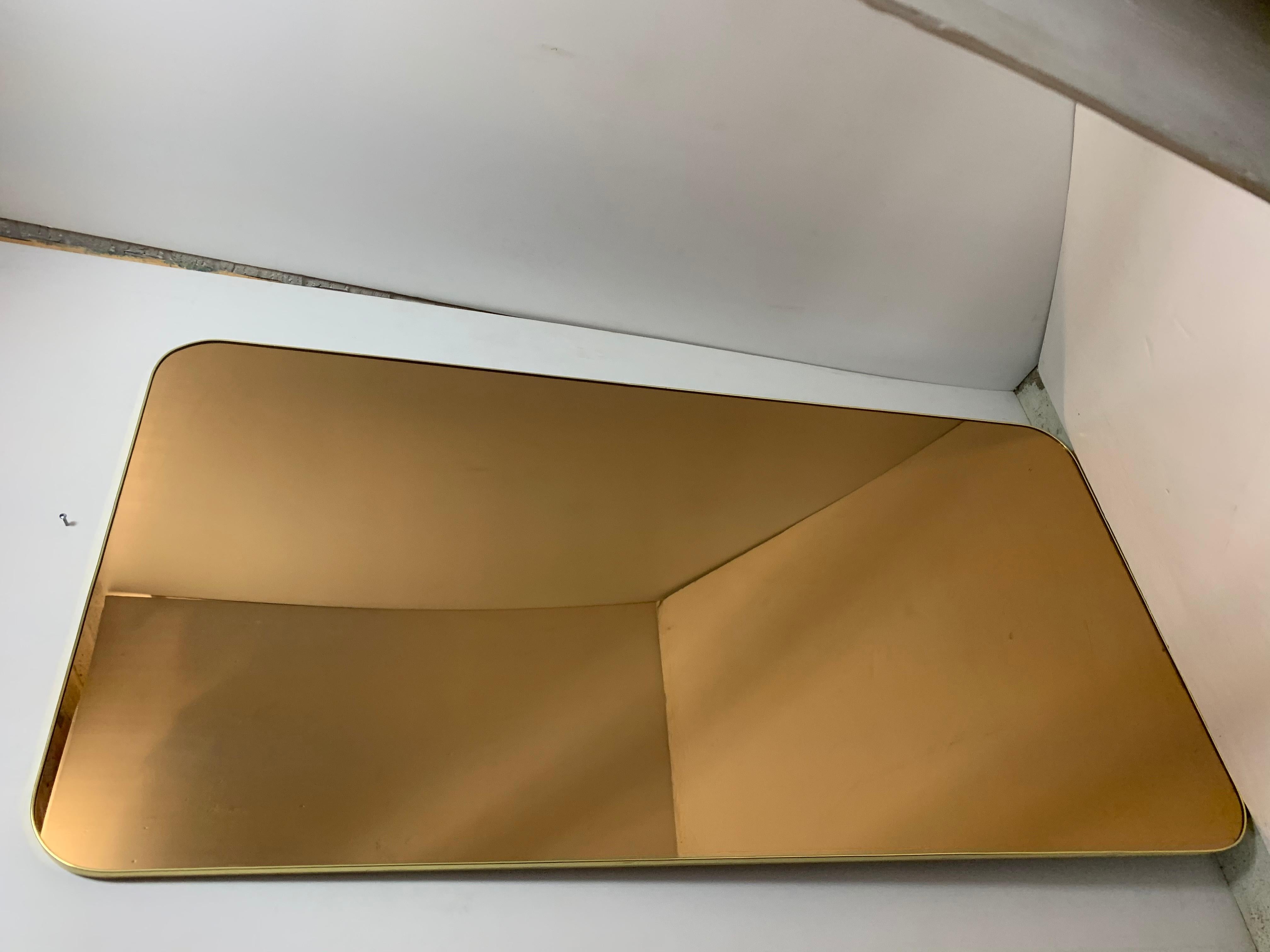 Large full size gold smoked rectangle mirror, horizontal or vertical narrow and thin framed with bronzed smoke glass, totally different than any other mirror, yet still functional, excellent for a bar or a restaurant.