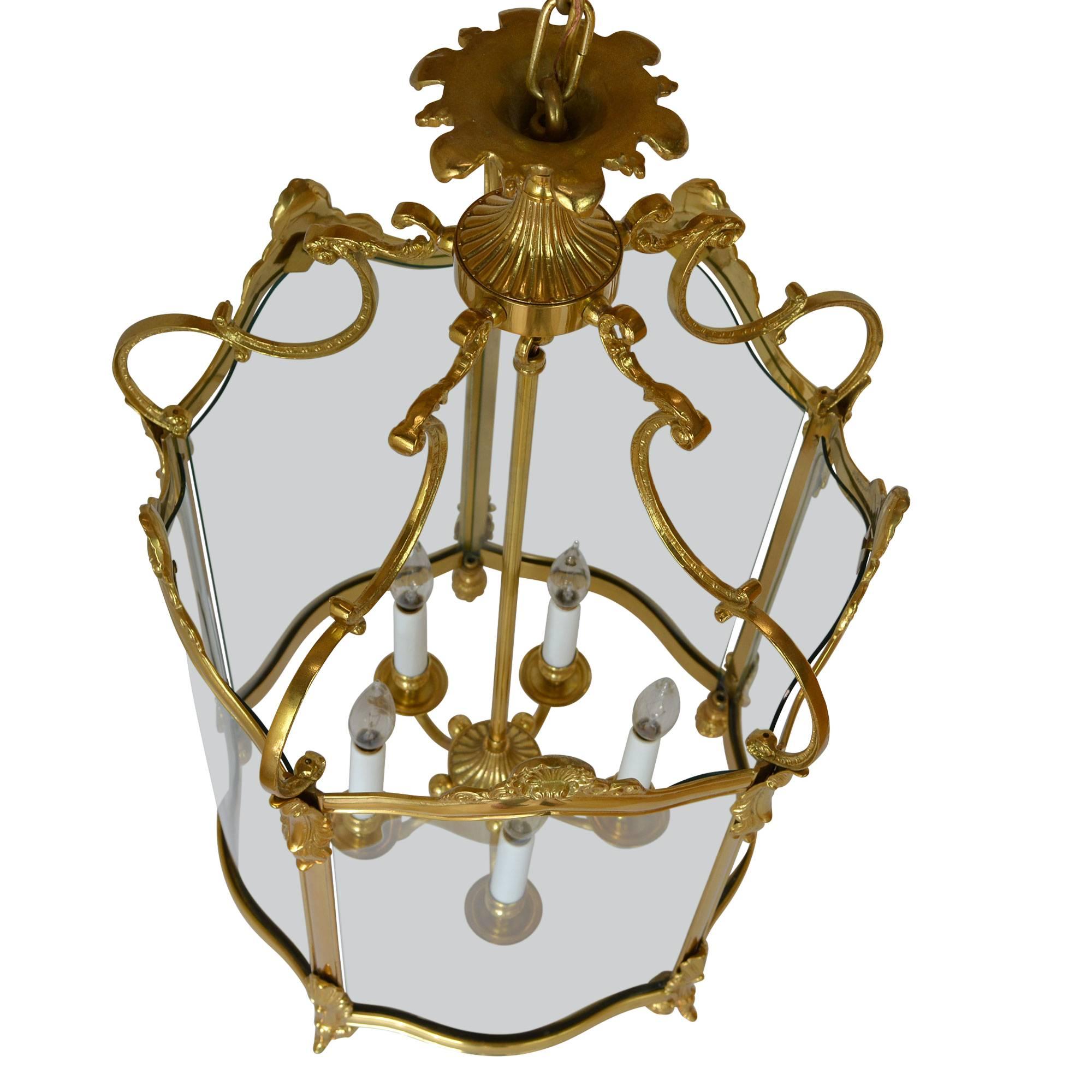 This is one of three lights we had the opportunity to rescue from a renovation project in Miami. It has five lights that are surrounded by impressive rounded glass, Europe, circa 1950.  The glass is clear with a unique curve shape. 

Measure: 31